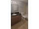 Bathroom featuring a shower, vanity, and a large mirror at 1023 S Hiawassee Rd # 4017, Orlando, FL 32835