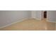 Bedroom with tile floor, neutral paint and a doorway into the kitchen at 1023 S Hiawassee Rd # 4017, Orlando, FL 32835