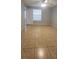 Bedroom features tile flooring, neutral paint, a ceiling fan, and natural light at 1023 S Hiawassee Rd # 4017, Orlando, FL 32835