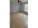 Bedroom features tile flooring, neutral paint, a ceiling fan, and natural light at 1023 S Hiawassee Rd # 4017, Orlando, FL 32835