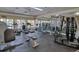 Well-equipped gym features multiple treadmills, weight machines, and plenty of room to work out at 1023 S Hiawassee Rd # 4017, Orlando, FL 32835