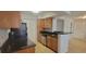 Well-equipped kitchen featuring granite countertops, stainless appliances, and ample cabinetry at 1023 S Hiawassee Rd # 4017, Orlando, FL 32835