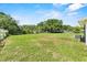An expansive backyard with a large grassy area perfect for recreation and entertainment at 120 & 0 8Th Wahneta W St, Winter Haven, FL 33880