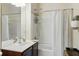 Bathroom featuring a single sink vanity and shower-tub combination at 1225 Bella Cara Ct # 1, Davenport, FL 33896