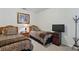 Bedroom featuring two twin beds with tropical pattern linens at 1225 Bella Cara Ct # 1, Davenport, FL 33896