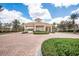 Arched entrance with guard station to the Bella Trae community at 1225 Bella Cara Ct # 1, Davenport, FL 33896