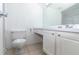 Well lit bathroom featuring a toilet, sink, vanity, and mirror with a shower/tub combination at 139 Oyster Bay Cir # 200, Altamonte Springs, FL 32701