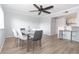 Charming dining room with modern table, chairs, and ceiling fan, ideal for Gathering meals at 139 Oyster Bay Cir # 200, Altamonte Springs, FL 32701