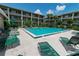 Relaxing pool area with ample seating and lush greenery for a serene retreat at 139 Oyster Bay Cir # 200, Altamonte Springs, FL 32701
