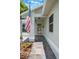 Inviting front entrance with tiled walkway and decorative front door, showcasing curb appeal at 1631 Woodbay Ct, Kissimmee, FL 34744