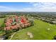 Drone shot featuring lovely community of homes near golf course and gorgeous green space at 1760 Saint Tropez Ct, Kissimmee, FL 34744