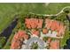 Overhead view of property, showing proximity to golf course, pond and community parking area at 1760 Saint Tropez Ct, Kissimmee, FL 34744