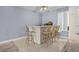 Breakfast bar featuring four chairs, offering a casual dining space that enhances the room's functionality at 1760 Saint Tropez Ct, Kissimmee, FL 34744