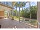 Relax and enjoy the outdoors on this screened-in patio with a brick floor at 1760 Saint Tropez Ct, Kissimmee, FL 34744