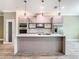 Kitchen with a center island, stainless steel appliances, and modern finishes at 1870 Brentwood Ct, Davenport, FL 33837
