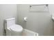 Picture of a standard toilet and towel rack in a small bathroom at 1870 Brentwood Ct, Davenport, FL 33837