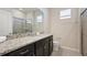 Bathroom with a single vanity with granite countertops, shower with glass doors and standard toilet at 2176 Lelani Cir, Davenport, FL 33897