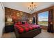 Themed bedroom featuring brick wallpaper, a plush bed, and Harry Potter decor at 2176 Lelani Cir, Davenport, FL 33897