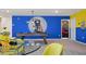 Fun game room featuring a pool table, themed decor, and access to another themed bedroom at 2176 Lelani Cir, Davenport, FL 33897