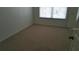 Bedroom with neutral carpet, a window for natural light, and closet space at 2219 San Vittorino Cir # 106, Kissimmee, FL 34741