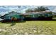 Charming one-story home with solar panels, well-manicured lawn, and brick accents at 2266 Lake Lizzie Ct, St Cloud, FL 34771