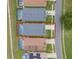 Aerial view of the property showing the screen-enclosed pool, backyard and nearby street at 2685 Oneida Loop, Kissimmee, FL 34747