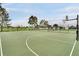 Community basketball court with fenced-in area at 2685 Oneida Loop, Kissimmee, FL 34747