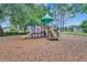 Colorful playground featuring slides, stairs, and climbing structures, set on a soft mulch surface at 2685 Oneida Loop, Kissimmee, FL 34747