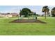 Outdoor workout area with exercise bars, benches, and equipment, perfect for fitness enthusiasts at 2685 Oneida Loop, Kissimmee, FL 34747