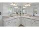 Bathroom featuring double sinks, vanity, and tile flooring at 307 Balmoral Ct, Davenport, FL 33896