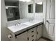 Stylish bathroom featuring a double vanity with modern fixtures and finishes at 3301 Soho St # 104, Orlando, FL 32835