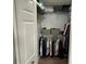 Organized walk-in closet with ample hanging space and shelving at 3301 Soho St # 104, Orlando, FL 32835
