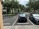 Apartment complex parking lot in front of building at 3301 Soho St # 104, Orlando, FL 32835