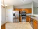 Well-equipped kitchen with stainless steel appliances and granite countertops at 4215 Red Bird Ave, St Cloud, FL 34772
