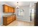 Eat-in kitchen featuring stainless steel appliances and ample storage at 4215 Red Bird Ave, St Cloud, FL 34772