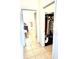 Hallway featuring doorways to a bathroom and a closet at 4250 Roberta Dr, Winter Haven, FL 33881