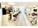 Open concept living space with island kitchen, dining area, and living room at 4250 Roberta Dr, Winter Haven, FL 33881
