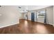 Spacious living room showcasing hardwood floors, and natural light, and a contemporary ceiling fan at 431 Eastern Ave, St Cloud, FL 34769