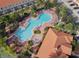 A beautiful aerial view of the community pool area at 4850 Coral Castle Dr, Kissimmee, FL 34746