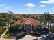 Overhead shot of clubhouse and the nearby pool at 4850 Coral Castle Dr, Kissimmee, FL 34746