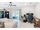 Living room featuring sliding glass doors, that lead to the outside patio at 4850 Coral Castle Dr, Kissimmee, FL 34746
