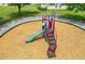 Community playground with slide and climbing structure for enjoyment at 4850 Coral Castle Dr, Kissimmee, FL 34746