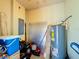 Storage room featuring utilities and miscellaneous stored items at 4850 Coral Castle Dr, Kissimmee, FL 34746