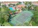 Community amenities include pool, clubhouse, and a tennis court at 4850 Coral Castle Dr, Kissimmee, FL 34746
