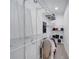Walk-in closet features custom shelving, hanging rods, and ample storage space for shoes and clothing at 640 Floridian Dr, Kissimmee, FL 34758