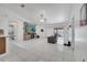 Open-concept living room with tile floors, fireplace, ceiling fan, tv, and a sliding door at 640 Floridian Dr, Kissimmee, FL 34758
