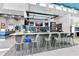 Bright common area with a counter and stools at 7770 Sandy Ridge Dr # 142, Kissimmee, FL 34747