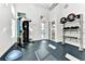 Bright gym area with weights and a functional trainer machine at 7770 Sandy Ridge Dr # 142, Kissimmee, FL 34747