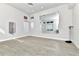 Empty gym area with a large mirror, scale, and natural light at 7770 Sandy Ridge Dr # 142, Kissimmee, FL 34747