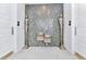 Decorated hallway with drinking fountains flanked by statues at 7770 Sandy Ridge Dr # 142, Kissimmee, FL 34747